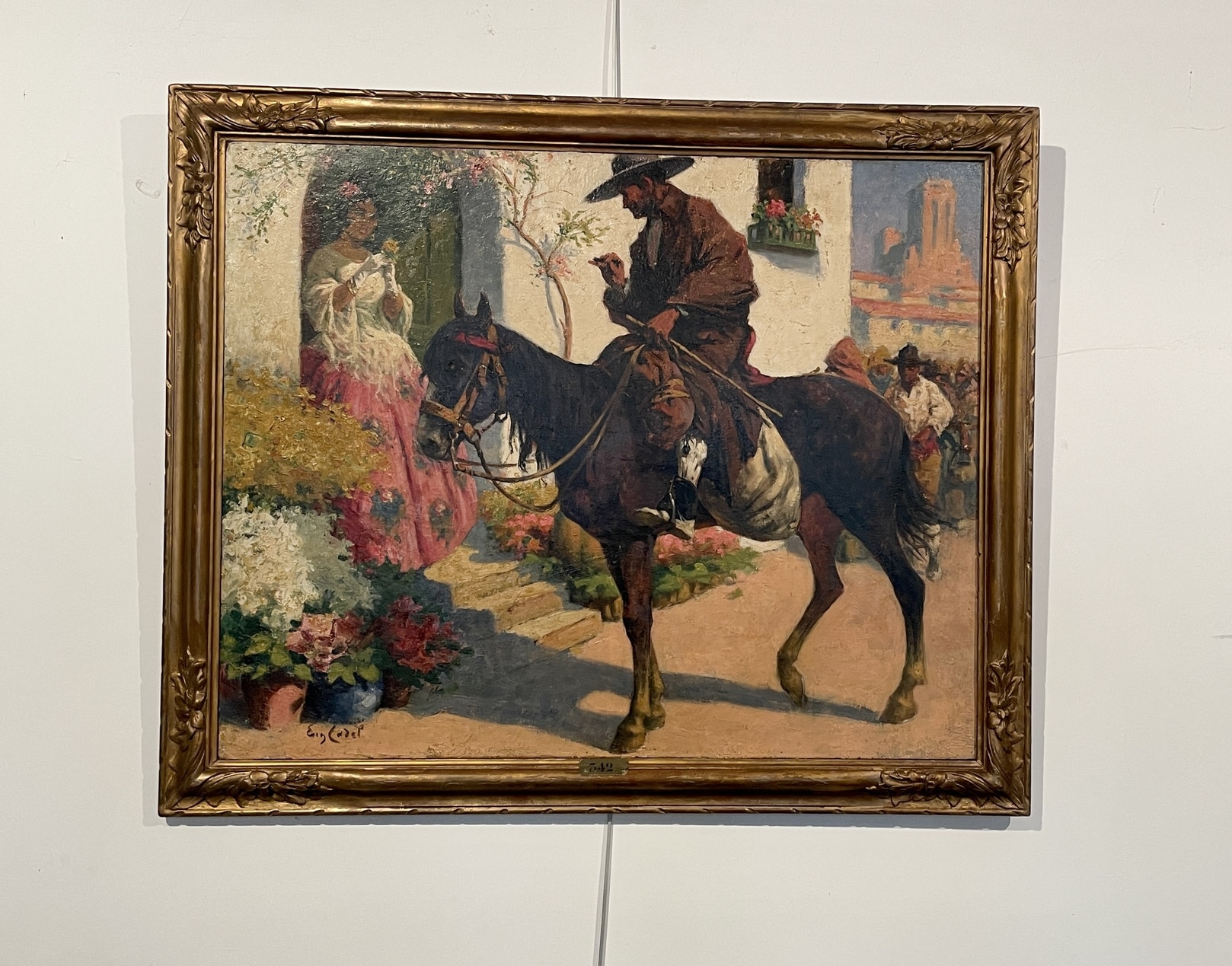 Huile sur toile figurant une scène de genre espagnole, signée Eugène Cadel (1862 - 1941)